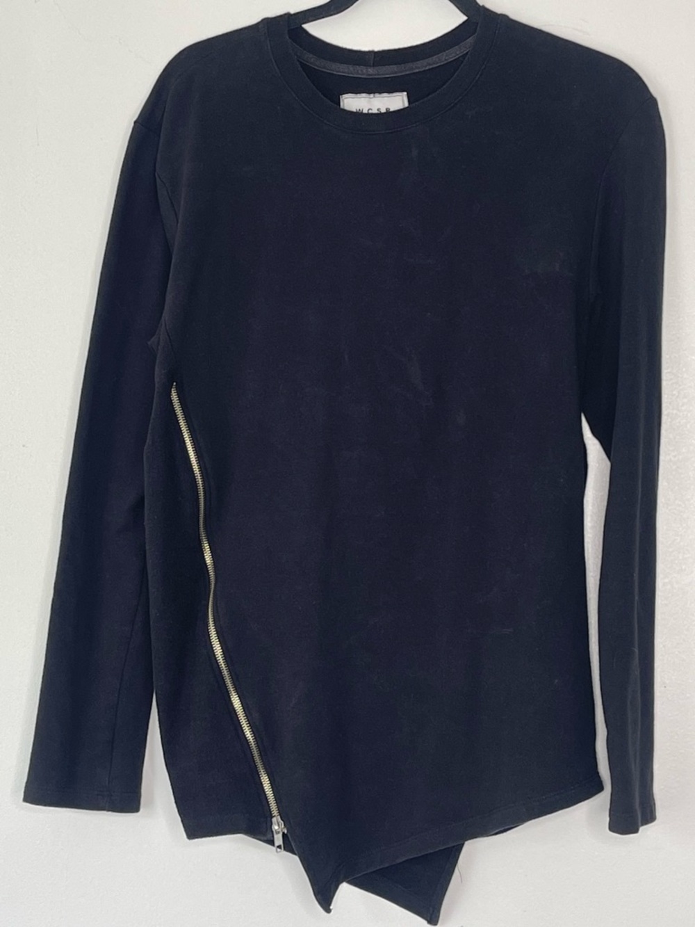 WCSP urban street wear. Black long sleeve with zipper down side. Size small.